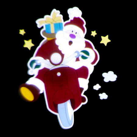 Proiettore a led per esterno ed interno Babbo Natale con Vespa decorazione natalizia