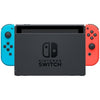 Console Nintendo Switch con una gioia rossa neon e un gioia blu neon