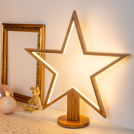 Stella luminosa a led luce bianco caldo con base in legno naturale decorazione natalizia