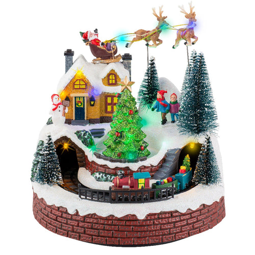 Scena animata per villaggio di Natale con personaggi con luci e movimento h 21 cm