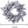 Ghirlanda tonda corona dietro porta innevato con pigne in PE effetto real touch