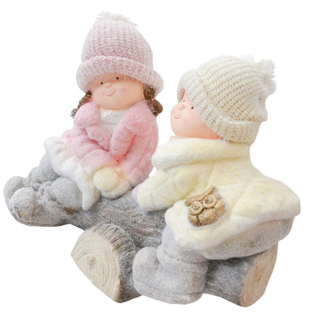 Bimbi con cappello in lana su giostrina decorazione natalizia in poli-resina h 40 cm