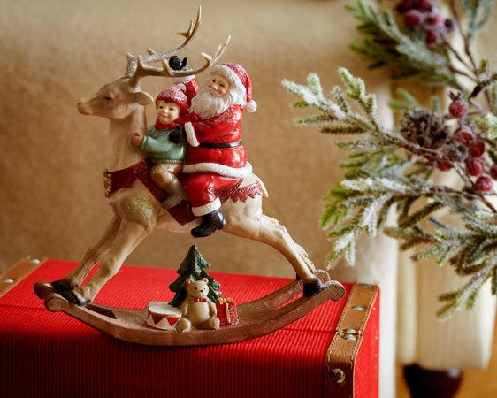 Statuetta con babbo natale su renna con bambino, decorazione per interno h 22.5 cm