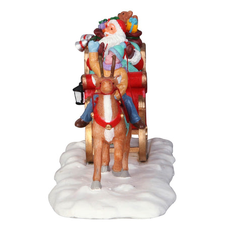 Slitta di Babbo Natale con renna e bambino figura per villaggio di Natale in poliresina