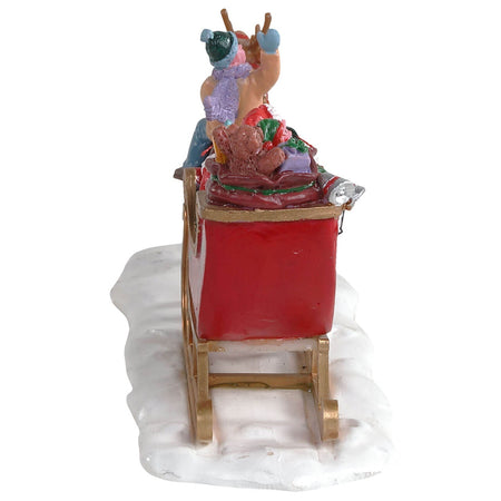 Slitta di Babbo Natale con renna e bambino figura per villaggio di Natale in poliresina