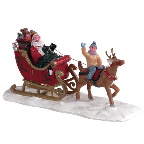 Slitta di Babbo Natale con renna e bambino figura per villaggio di Natale in poliresina