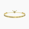 Kidult - Bracciale dorato elastico con frase SIMPLY A WONDER WOMAN