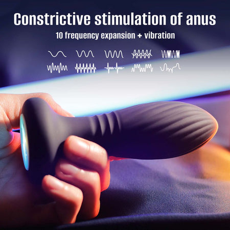 Stimolatore anal plug anale in silicone con luci LED colorate e caricatore USB magnetico