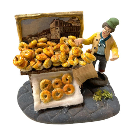 Pastore con ciambelle statuetta in terracotta artigianale per presepe napoletano