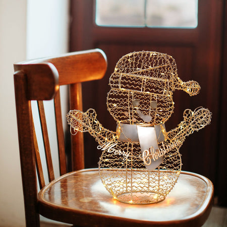 Pupazzo di neve "Merry Christmas" color champagne luminoso con MicroLed a luce calda da h30 cm