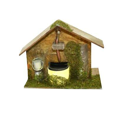 Fontana per presepe con tetto paesaggio in legno h 13 cm