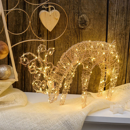 Renna tridimensionale luminosa "Renna che Bruca" decorazione in filo di rame con microled a luce calda