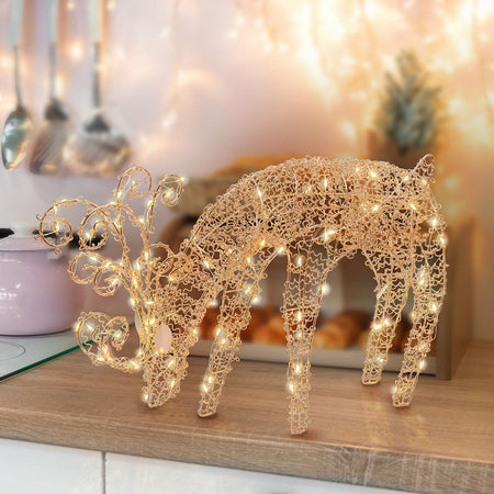 Renna tridimensionale luminosa "Renna che Bruca" decorazione in filo di rame con microled a luce calda