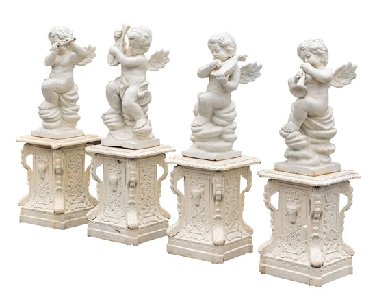 Biscottini Set 4 statue in fusione di ghisa finitura bianca anticata