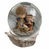 Sfera d'acqua Natività magica di cristallo con neve che cade e piedistallo