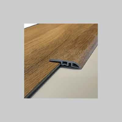 Profilo Di Adattamento Per Pavimento In Spc Colore Noce