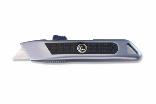 Coltello Con Lama Trapezioidale Autoretrattile- - Mm.150X20X40H. - 12 Blister Alte