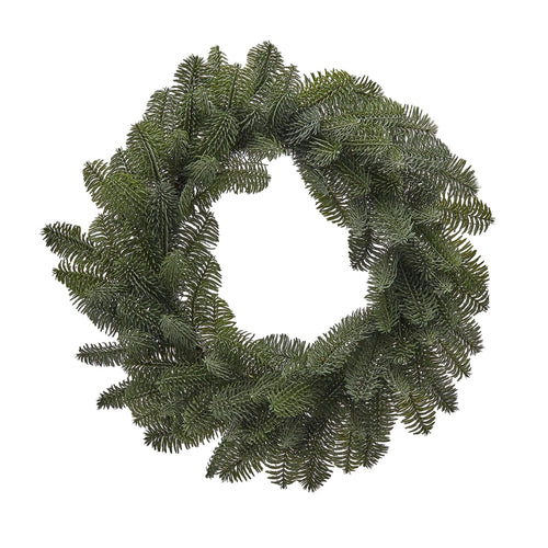Ghirlanda tonda con punte di Pino Nobilis West corona natalizia, dietro porta verde