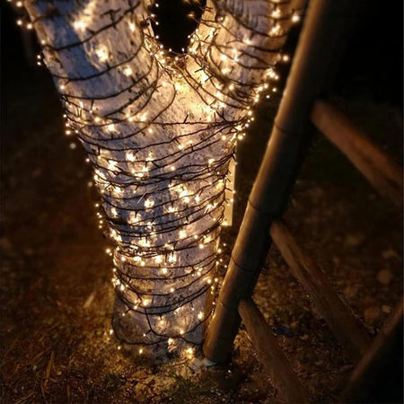 Catena luminosa da 240 LED Bianco caldo lunga 15m per interno/esterno