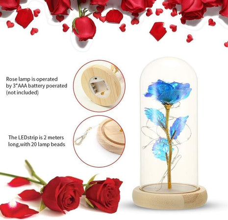Rosa blu in lamina d'oro con luce a LED in base in legno con cupola di vetro