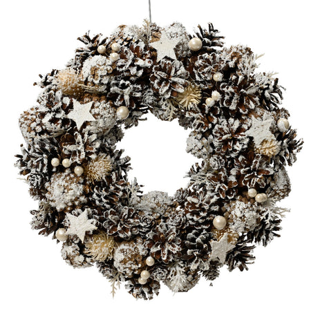 Ghirlanda tonda natalizia con pigne innevate dietro porta 34 cm