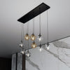 Sospensione Moderna 9 Luci Cosmo In Acciaio Nero E Sfere In Vetro Multicolor