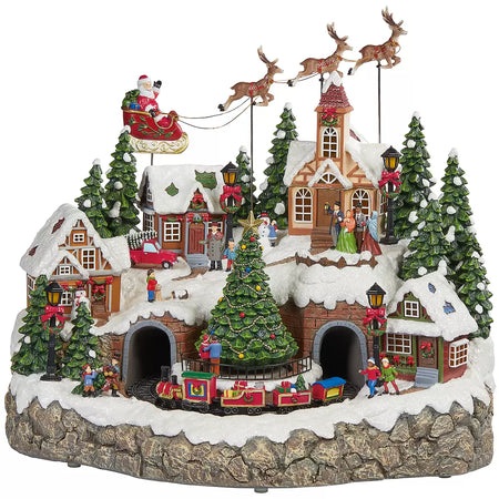 Scena animata a Led con negozi e babbo natale con renne con luci 40 cm