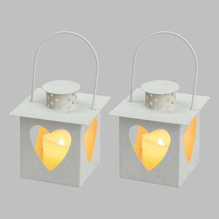 Set 2 lanterne e 2 candele a led con cuori traforati per decorazioni da interno.