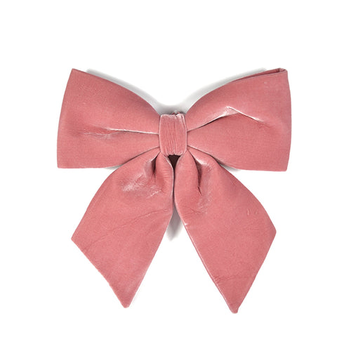 Fiocco Rosa in velluto imbottito decorazione natalizia per albero e ghirlanda dietro porta