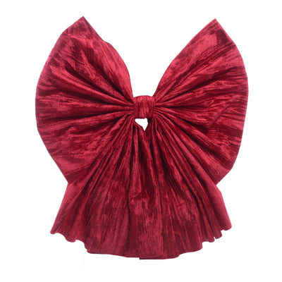 Fiocco di natale in tessuto decorazione natalizia per albero e dietro porta