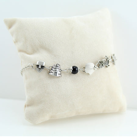 Bracciale donna coccu con simboli sardegna dea madre pavoncella moro nuraghe