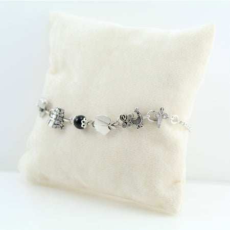 Bracciale donna coccu con simboli sardegna dea madre pavoncella moro nuraghe