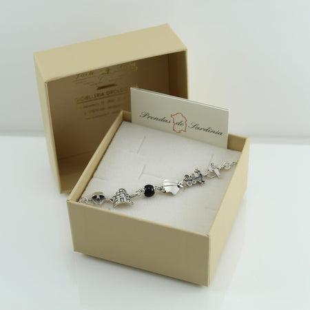 Bracciale donna coccu con simboli sardegna dea madre pavoncella moro nuraghe
