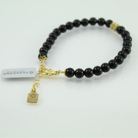 Bracciale portafortuna Su Coccu sfere onice e filigrana d'argento dorato 6 mm