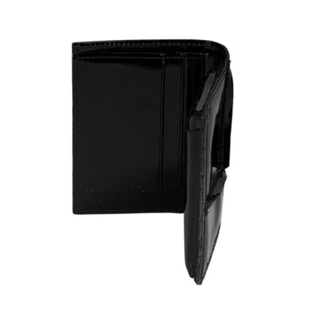 COMME DES GARCONS WALLET Reversed Hem portafoglio in pelle in nero da donna