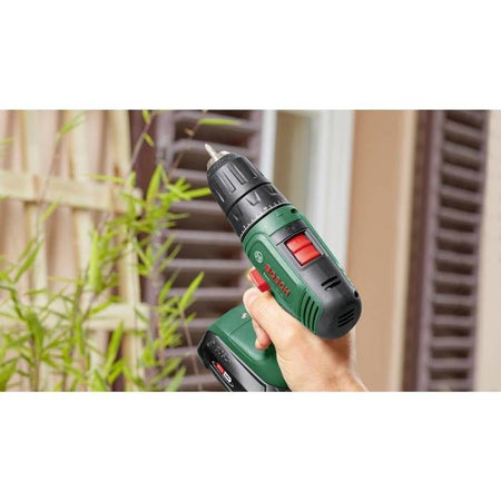 Bosch Home and Garden 06039D810D Trapano a percussione a batteria agli ioni di litio da 18 V e 1,5 Ah + 2 batterie + caricabatterie