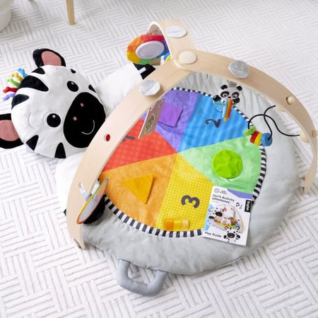 BABY EINSTEIN Tappeto gioco Zen's Activity Milestones con barra in legno, giochi multisensoriali, dalla nascita