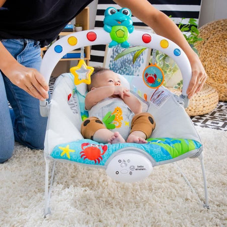 BABY EINSTEIN Sedia a sdraio Neptune - Ocean Explorers, 15 melodie, luci, vibrazioni