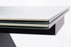 Tavolo allungabile Blazar con struttura in acciaio, piano in ceramica e supporto in vetro