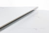 Tavolo allungabile Blazar con struttura in acciaio, piano in ceramica e supporto in vetro