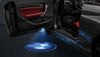 KIT LUCI LED LOGO PROIETTORE PORTIERA BMW BATTERIA SENSORE MAGNETE UNIVER