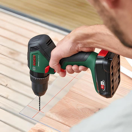 Trapano a percussione Universal Impact 18V + seghetto alternativo BOSCH PST 18 + 2 batterie da 2,0 Ah + caricabatteria + valigetta 06039D410B