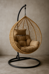 Poltrona a dondolo sospesa Amirantes per giardino e veranda in rattan con cuscino