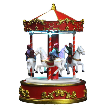 Giostra per villaggio di natale carosello con bambini su cavallo e musiche h 22 cm