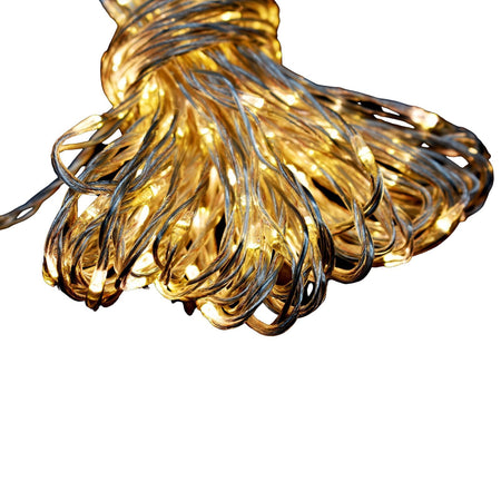 Catena lineare di 320 bean-led a luce calda con filo trasparente e giochi di luce memory