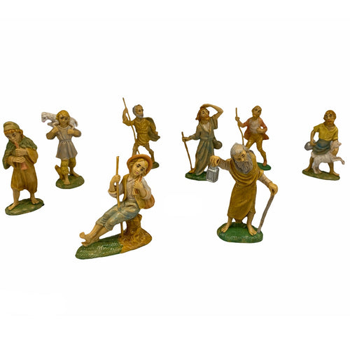 Statuette per presepe natalizio con 12 pastori assortiti in plastica