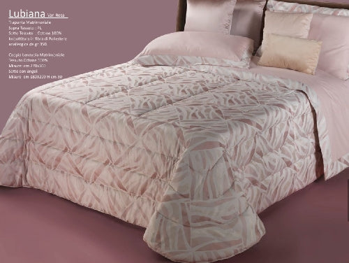 Trapunta matrimoniale art.Siria colore rosa Mon Amour imbottitura in fibra poliestere anallergica da gr.350 Sopra tessuto: PL sotto tessuto: cotone 100%