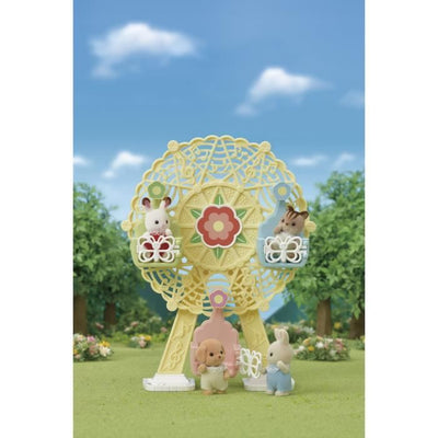 LA RUOTA GRANDE E BAMBINO BARBONCINO