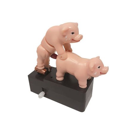 Action figure di due maialini che fanno sesso a pecorina con carica manuale
