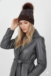 Cappello con pon pon